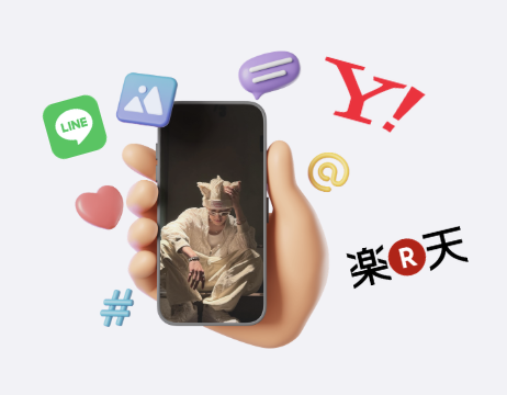 A hand holding a phone surrounded by app icons